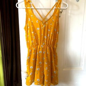 Sienna Sky xs yellow floral strappy romper